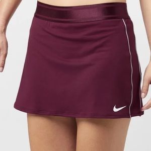 Nike worn once , Maroon